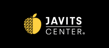 Logo of Javits Center featuring a yellow apple with a patterned segment, alongside the text "Javits Center." The logo sits elegantly against a black background, evocative of the nearby hotels that offer comfort and convenience for event attendees.