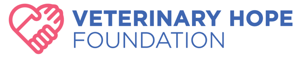 Logo for Veterinary Hope Foundation, featuring a pink heart formed by two hands and the organization name in blue text—a symbol celebrating compassion, much like our Veterinarian of the Year honorees.